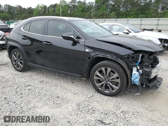 2021 Lexus UX 200 F Sport with VIN JTHE3JBHXM2033103, listed as a Copart auction lot 51348374 with 29,325 mi miles and . Bid and sale history available at DreamBid. Image 4.