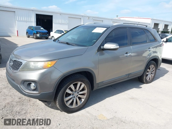 2011 Kia Sorento EX with VIN 5XYKU4A10BG113603, listed as a IAAI auction lot 42123052 with 238,437 mi miles. Bid and sale history available at carsss.com. Image 2.