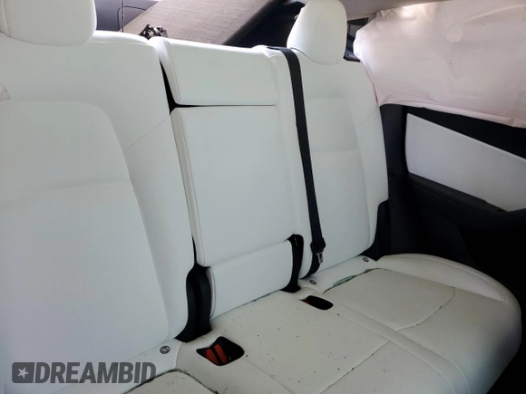 2022 Tesla Model Y Performance z VIN 7SAYGDEF2NF448013, wystawiony jako Copart lot #52323435 z przebiegiem Nie podano mil oraz Nie do naprawy • Non repairable. Historia ofert i sprzedaży dostępna na DreamBid. Obrazek 10.