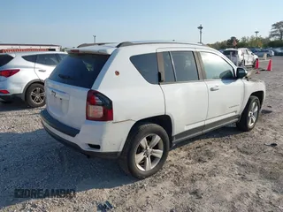 2014 Jeep Compass Sport with VIN 1C4NJDBB3ED892141, listed as a IAAI auction lot 40572980 with 95,826 mi miles. Bid and sale history available at carsss.com. Image 4.