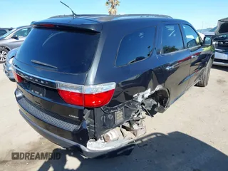 2013 Dodge Durango Crew with VIN 1C4RDHDG1DC666094, listed as a IAAI auction lot 41940121 with 93,131 mi miles and . Bid and sale history available at carsss.com. Image 4.