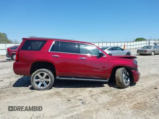 2019 Chevrolet Tahoe LT z VIN 1GNSKBKC2KR338107, wystawiony jako IAAI lot #41999167 z przebiegiem 117 260 mil mil oraz . Historia ofert i sprzedaży dostępna na DreamBid. Obrazek 13.