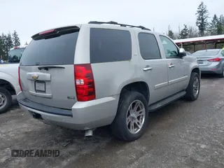 2007 Chevrolet Tahoe LTZ with VIN 1GNFK13047J373205, listed as a IAAI auction lot 41830747 with 182,361 mi miles and . Bid and sale history available at DreamBid. Image 4.