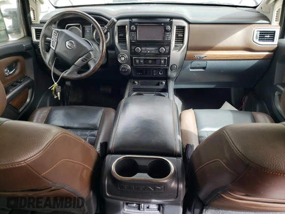 2016 Nissan Titan Pro-4X z VIN 1N6BA1F4XGN502773, wystawiony jako Copart lot #49285535 z przebiegiem 129 390 mil mil oraz Czysty tytuł • Clean title. Historia ofert i sprzedaży dostępna na DreamBid. Obrazek 8.