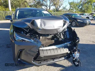 2025 Lexus NX with VIN 2T2ADCAZ0SC020938, listed as a IAAI auction lot 41296217 with 588 mi miles. Bid and sale history available at carsss.com. Image 6.