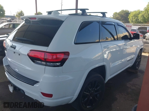 2018 Jeep Grand Cherokee Laredo E with VIN 1C4RJFAG5JC303228, listed as a IAAI auction lot 42375212 with 98,155 mi miles and . Bid and sale history available at DreamBid. Image 4.