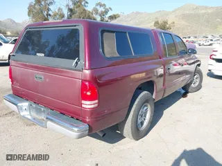 2000 Dodge Dakota Sport with VIN 1B7GL2AX9YS776169, listed as a IAAI auction lot 41857696 with 161,780 mi miles. Bid and sale history available at carsss.com. Image 4.