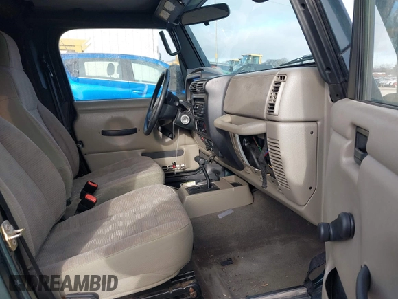 2005 Jeep Wrangler SE with VIN 1J4FA29S45P333916, listed as a IAAI auction lot 41214841 with 90,577 mi miles. Bid and sale history available at carsss.com. Image 5.