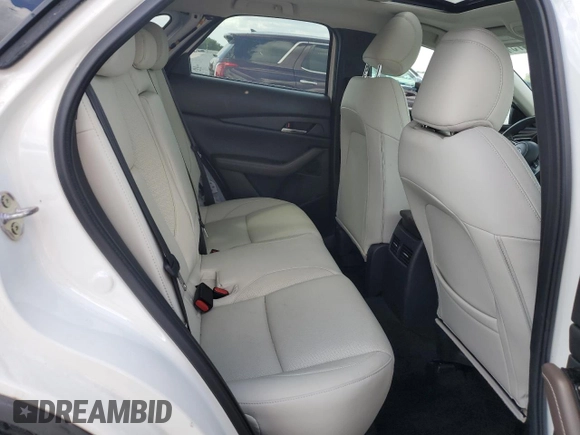 2021 Mazda CX-30 Premium z VIN 3MVDMADM5MM228747, wystawiony jako Copart lot #51747475 z przebiegiem 13 562 mil mil oraz Nie do naprawy • Non repairable. Historia ofert i sprzedaży dostępna na DreamBid. Obrazek 11.