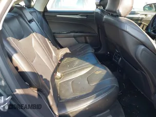 2016 Ford Fusion Titanium with VIN 3FA6P0K90GR188049, listed as a IAAI auction lot 42575477 with 239,414 mi miles and . Bid and sale history available at DreamBid. Image 8.