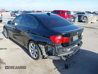 2015 BMW 3 Series 320i with VIN WBA3B1G52FNT63889, listed as a IAAI auction lot 41717925 with 73,736 mi miles. Bid and sale history available at carsss.com. Image 3.