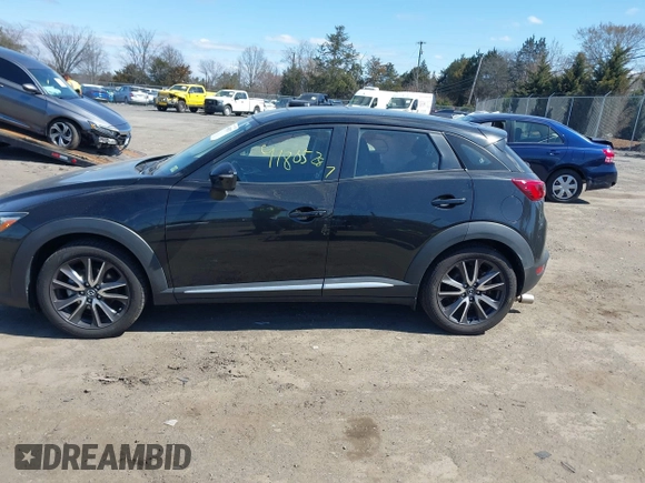 2018 Mazda CX-3 Grand Touring z VIN JM1DKFD75J0312662, wystawiony jako IAAI lot #41805287 z przebiegiem 140 083 mil mil oraz . Historia ofert i sprzedaży dostępna na DreamBid. Obrazek 14.