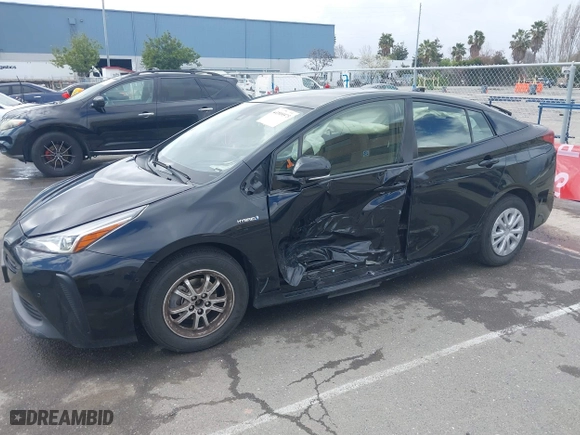 2019 Toyota Prius L Eco with VIN JTDKARFU8K3082503, listed as a IAAI auction lot 41809373 with 247,315 mi miles. Bid and sale history available at carsss.com. Image 6.