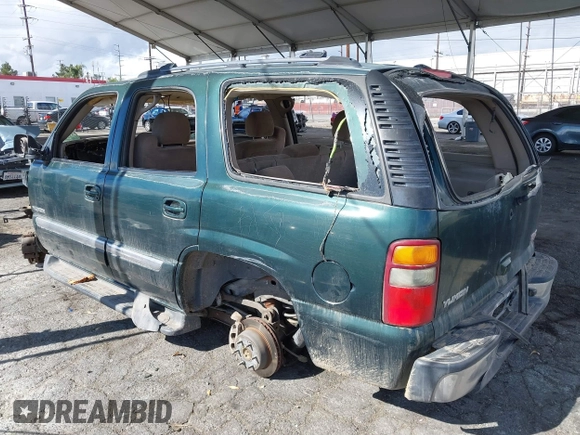 2003 GMC Yukon SLT z VIN 1GKEC13V43J304588, wystawiony jako IAAI lot #41525446 z przebiegiem Nie podano mil oraz . Historia ofert i sprzedaży dostępna na DreamBid. Obrazek 3.