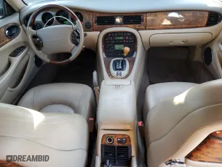 2001 Jaguar XJ VDP with VIN SAJDA24C11LF28715, listed as a Copart auction lot 65246334 with 107,965 mi miles and Salvage Title. Bid and sale history available at carsss.com. Image 8.