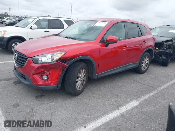 2016 Mazda CX-5 Touring with VIN JM3KE2CY3G0877185, listed as a IAAI auction lot 41729243 with 144,656 mi miles. Bid and sale history available at carsss.com. Image 17.