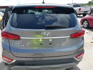 2019 Hyundai Santa Fe SE with VIN 5NMS23AD2KH108936, listed as a IAAI auction lot 42626196 with 72,757 mi miles and . Bid and sale history available at DreamBid. Image 16.