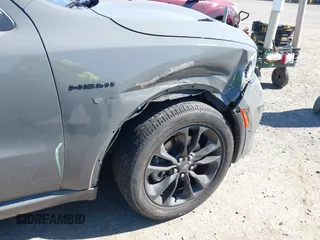 2022 Dodge Durango R/T with VIN 1C4SDJCT9NC230716, listed as a IAAI auction lot 42676407 with 21,791 mi miles and . Bid and sale history available at DreamBid. Image 17.