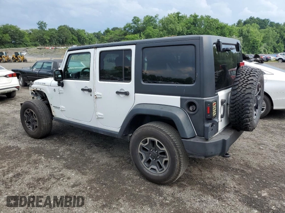 2014 Jeep Wrangler Unlimited Rubicon with VIN 1C4HJWFG4EL114743, listed as a Copart auction lot 61397575 with 110,222 mi miles and Salvage title. Bid and sale history available at DreamBid. Image 2.