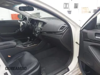 2016 Kia Cadenza Premium with VIN KNALN4D71G5213580, listed as a IAAI auction lot 41306716 with 124,664 mi miles. Bid and sale history available at carsss.com. Image 5.