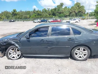 2014 Chevrolet Impala LT with VIN 2G1WB5E31E1146318, listed as a IAAI auction lot 40413281 with 422,345 mi miles and . Bid and sale history available at DreamBid. Image 14.