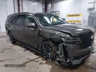 2021 Cadillac Escalade ESV Sport z VIN 1GYS4PKL8MR346984, wystawiony jako IAAI lot #42290436 z przebiegiem 100 970 mil mil oraz . Historia ofert i sprzedaży dostępna na DreamBid. Obrazek 1.