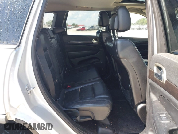2011 Jeep Grand Cherokee Laredo with VIN 1J4RR4GG2BC714893, listed as a IAAI auction lot 42750763 with 184,475 mi miles and . Bid and sale history available at DreamBid. Image 8.