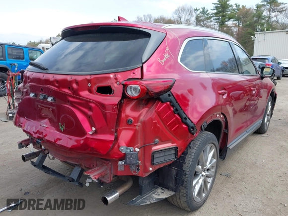 2019 Mazda CX-9 Grand Touring with VIN JM3TCBDY8K0333394, listed as a IAAI auction lot 42109778 with 58,887 mi miles and . Bid and sale history available at DreamBid. Image 4.