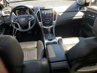 2014 Cadillac SRX Luxury Collection z VIN 3GYFNEE32ES647165, wystawiony jako Copart lot #52331335 z przebiegiem 27 277 mil mil oraz Szkoda całkowita • Salvage title. Historia ofert i sprzedaży dostępna na DreamBid. Obrazek 8.