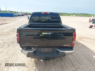 2012 GMC Canyon SLE1 z VIN 1GTD5MFE0C8133103, wystawiony jako IAAI lot #42193321 z przebiegiem 168 277 mil mil oraz . Historia ofert i sprzedaży dostępna na DreamBid. Obrazek 16.