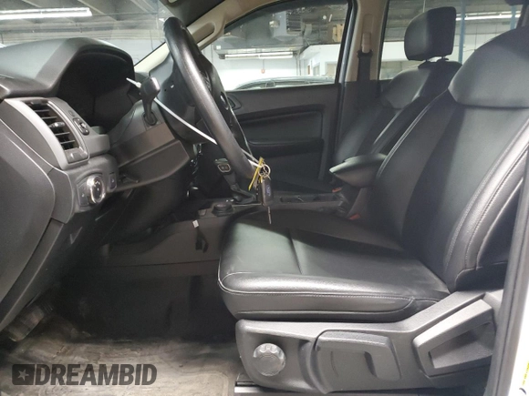 2023 Ford Ranger XL with VIN 1FTER4FH2PLE26247, listed as a Copart auction lot 53163535 with 27,444 mi miles and Salvage title. Bid and sale history available at DreamBid. Image 7.