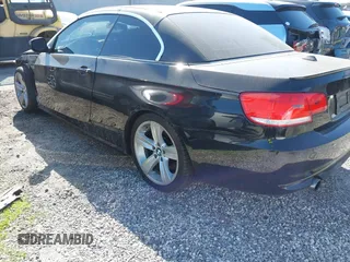 2010 BMW 3 Series 335i with VIN WBAWL7C56AP476194, listed as a IAAI auction lot 41397024 with 69,346 mi miles. Bid and sale history available at carsss.com. Image 3.