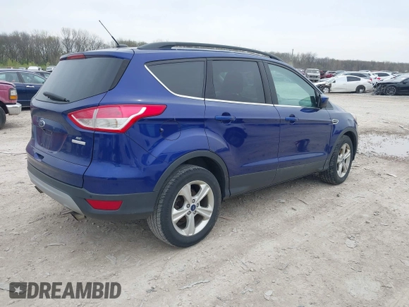 2016 Ford Escape SE with VIN 1FMCU0GX9GUB93543, listed as a IAAI auction lot 42017226 with 208,092 mi miles. Bid and sale history available at carsss.com. Image 4.