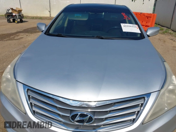 2012 Hyundai Azera z VIN KMHFH4JGXCA182208, wystawiony jako IAAI lot #42559319 z przebiegiem 236 086 mil mil oraz . Historia ofert i sprzedaży dostępna na DreamBid. Obrazek 21.