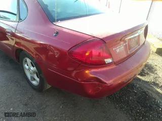 2001 Ford Taurus SES with VIN 1FAFP55U41A281039, listed as a IAAI auction lot 41676971 with 139,866 mi miles. Bid and sale history available at carsss.com. Image 6.