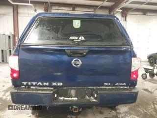 2017 Nissan Titan Pro-4X z VIN 1N6BA1F44HN551551, wystawiony jako IAAI lot #41581877 z przebiegiem 64 834 mil mil oraz . Historia ofert i sprzedaży dostępna na DreamBid. Obrazek 17.