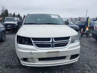 2015 Dodge Journey SE z VIN 3C4PDCAB6FT736330, wystawiony jako IAAI lot #41837047 z przebiegiem 123 567 mil mil oraz . Historia ofert i sprzedaży dostępna na DreamBid. Obrazek 13.