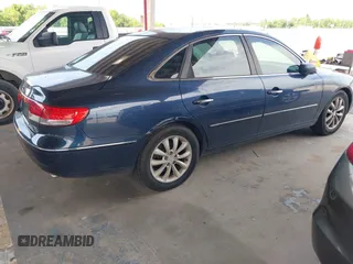 2007 Hyundai Azera SE z VIN KMHFC46FX7A147219, wystawiony jako IAAI lot #42346432 z przebiegiem 163 646 mil mil oraz . Historia ofert i sprzedaży dostępna na DreamBid. Obrazek 4.
