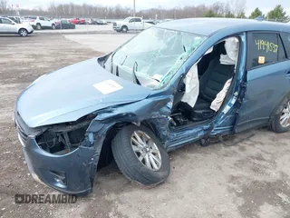 2016 Mazda CX-5 Touring with VIN JM3KE4CY8G0858045, listed as a IAAI auction lot 41941537 with 103,532 mi miles. Bid and sale history available at carsss.com. Image 6.