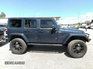 2013 Jeep Wrangler Unlimited Sport z VIN 1C4BJWDG1DL660844, wystawiony jako IAAI lot #42347284 z przebiegiem 168 709 mil mil oraz . Historia ofert i sprzedaży dostępna na DreamBid. Obrazek 13.