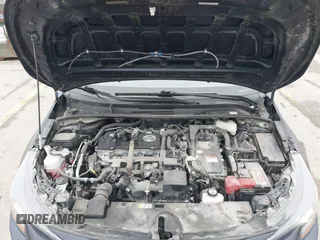 2021 Toyota Corolla Hybrid LE with VIN JTDEAMDE9MJ003172, listed as a IAAI auction lot 42062851 with 96,753 mi miles. Bid and sale history available at carsss.com. Image 10.