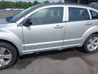 2011 Dodge Caliber Mainstreet with VIN 1B3CB3HA2BD179211, listed as a IAAI auction lot 42084745 with 136,276 mi miles. Bid and sale history available at carsss.com. Image 6.