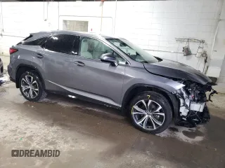2021 Lexus RX with VIN 2T2HZMDA7MC278601, listed as a Copart auction lot 53666995 with 61,033 mi miles and Salvage Title. Bid and sale history available at carsss.com. Image 4.