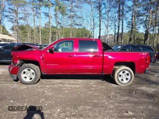 2018 Chevrolet Silverado 1500 LT with VIN 3GCUKREC4JG204672, listed as a IAAI auction lot 41638941 with 134,506 mi miles. Bid and sale history available at carsss.com. Image 14.