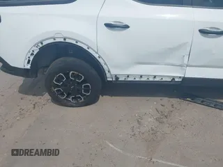 2022 Hyundai Santa Cruz SEL z VIN 5NTJBDAE5NH007005, wystawiony jako IAAI lot #42058065 z przebiegiem 30 825 mil mil oraz . Historia ofert i sprzedaży dostępna na DreamBid. Obrazek 19.