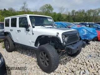 2014 Jeep Wrangler Unlimited Sahara z VIN 1C4HJWEG8EL257437, wystawiony jako Copart lot #55594695 z przebiegiem 157 575 mil mil oraz Czysty tytuł • Clean title. Historia ofert i sprzedaży dostępna na DreamBid. Obrazek 4.