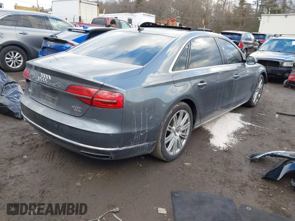 2015 Audi A8 L 4.0T with VIN WAU32AFD4FN041084, listed as a IAAI auction lot 41450453 with 86,199 mi miles. Bid and sale history available at carsss.com. Image 4.