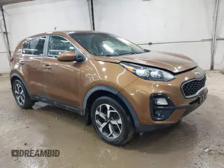 2020 Kia Sportage LX z VIN KNDPMCAC5L7752379, wystawiony jako IAAI lot #42357345 z przebiegiem 76 570 mil mil oraz . Historia ofert i sprzedaży dostępna na DreamBid. Obrazek 1.