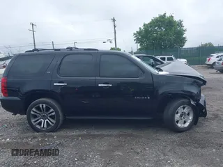 2007 Chevrolet Tahoe LT z VIN 1GNFK13017R210061, wystawiony jako IAAI lot #42256967 z przebiegiem Nie podano mil oraz . Historia ofert i sprzedaży dostępna na DreamBid. Obrazek 14.