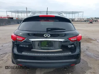 2014 Infiniti QX70 z VIN JN8CS1MU6EM450640, wystawiony jako IAAI lot #42335811 z przebiegiem 143 565 mil mil oraz . Historia ofert i sprzedaży dostępna na DreamBid. Obrazek 17.
